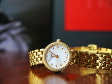 Load image into Gallery viewer, Tissot T-Lady Lovely Mother of Pearl Dial Gold Steel Strap Watch For Women - T058.009.63.116.00